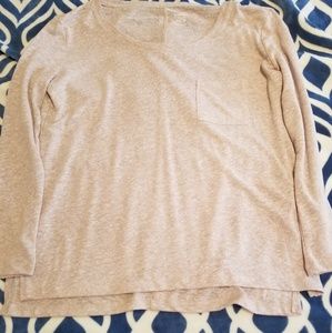 Long sleeved blush color scoop neck shirt.